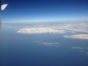 Hinflug über dem Atlantic mit Sicht auf Grönland